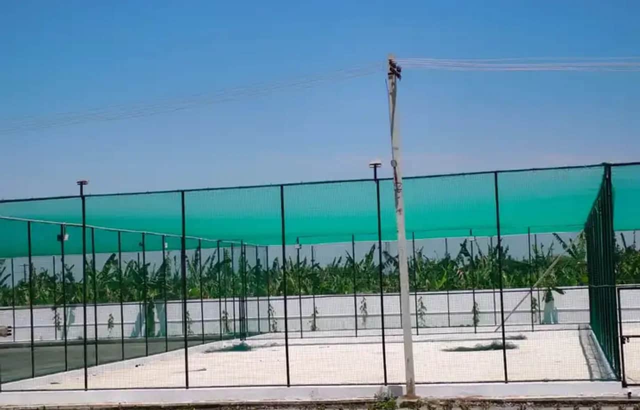 Sports net installation for the AECS Layout play area with ball-stop side protected