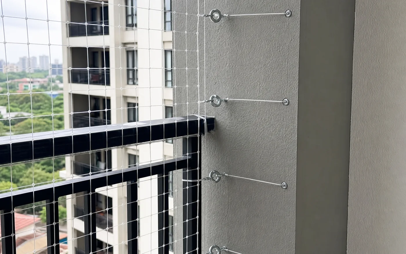 Whitefield balcony safety net corner fixing detail for side return coverage