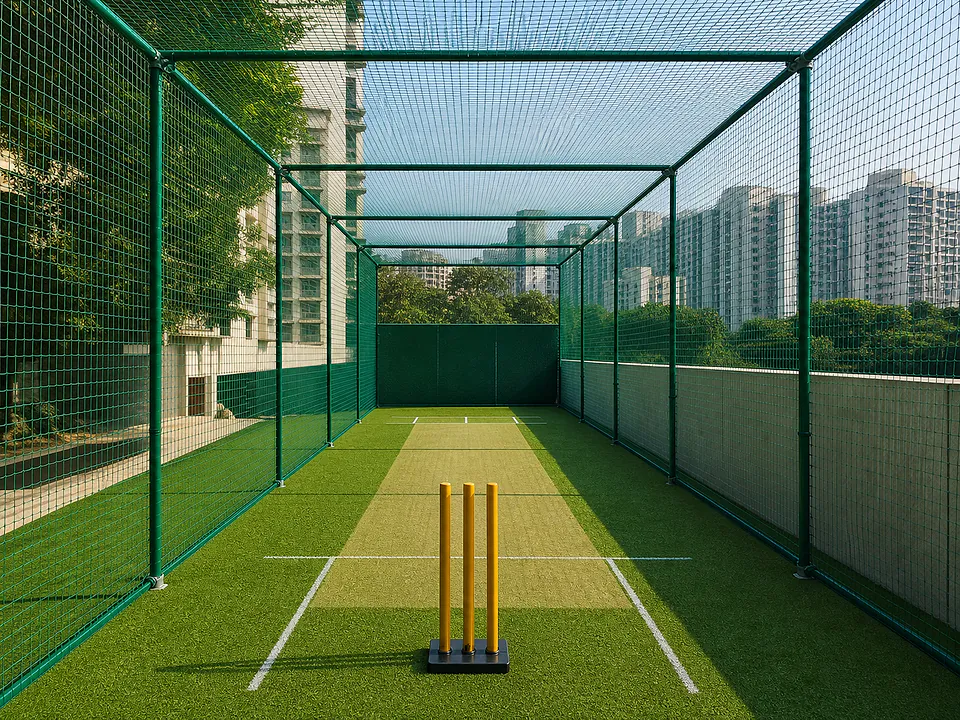 Cricket practice lane enclosed with green sports netting